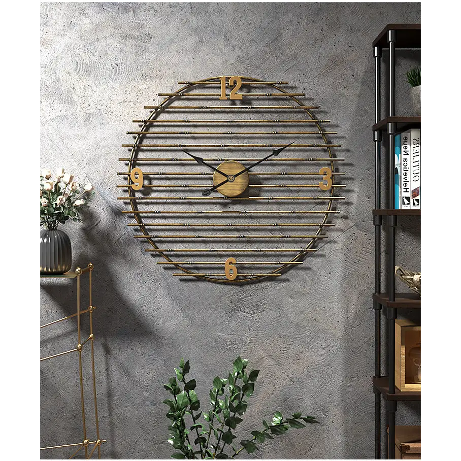 ORIEL - Horloge murale metal dore