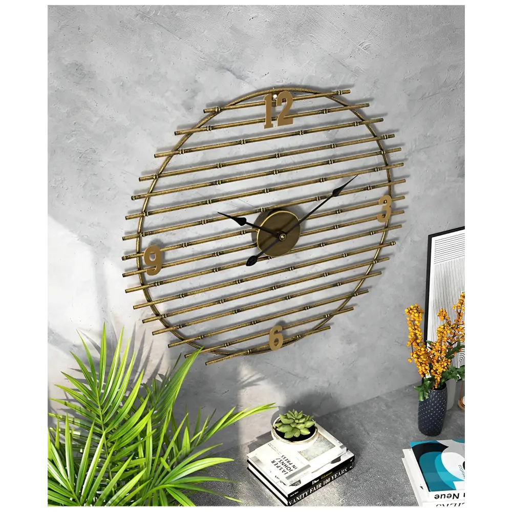 ORIEL - Horloge murale metal dore