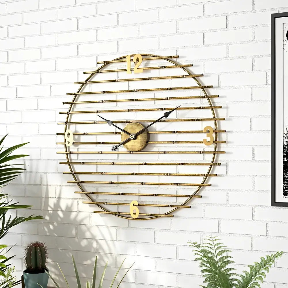 ORIEL - Horloge murale metal dore