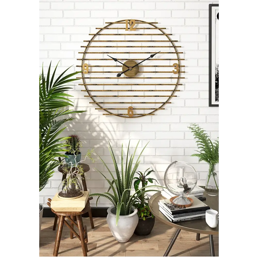 ORIEL - Horloge murale metal dore