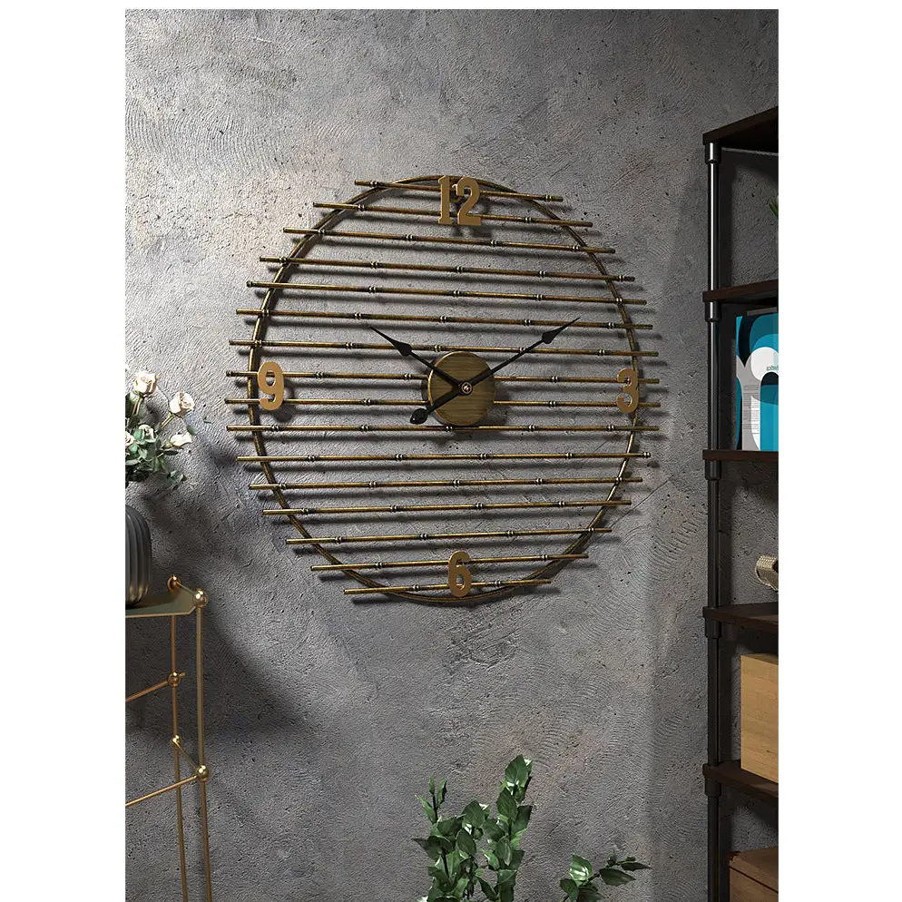 ORIEL - Horloge murale metal dore